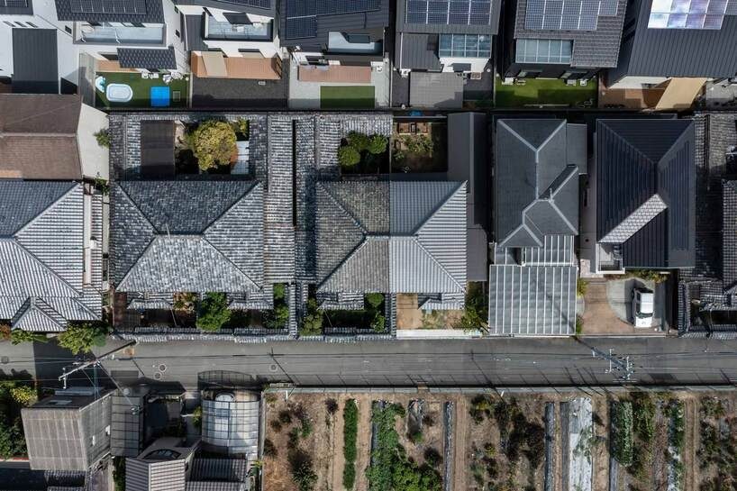 designboom's tweet photo. YYAA rebuilds the eastern half of a prewar rowhouse in #japan https://t.co/I6iTZ4bjig https://t.co/LbPoSDtXFG