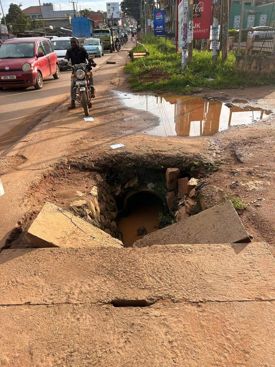 joshjeje2's tweet photo. Dear KCCA washing roads is not as urgent as closing these dangerous open manholes. https://t.co/Z9j9y9ZojN