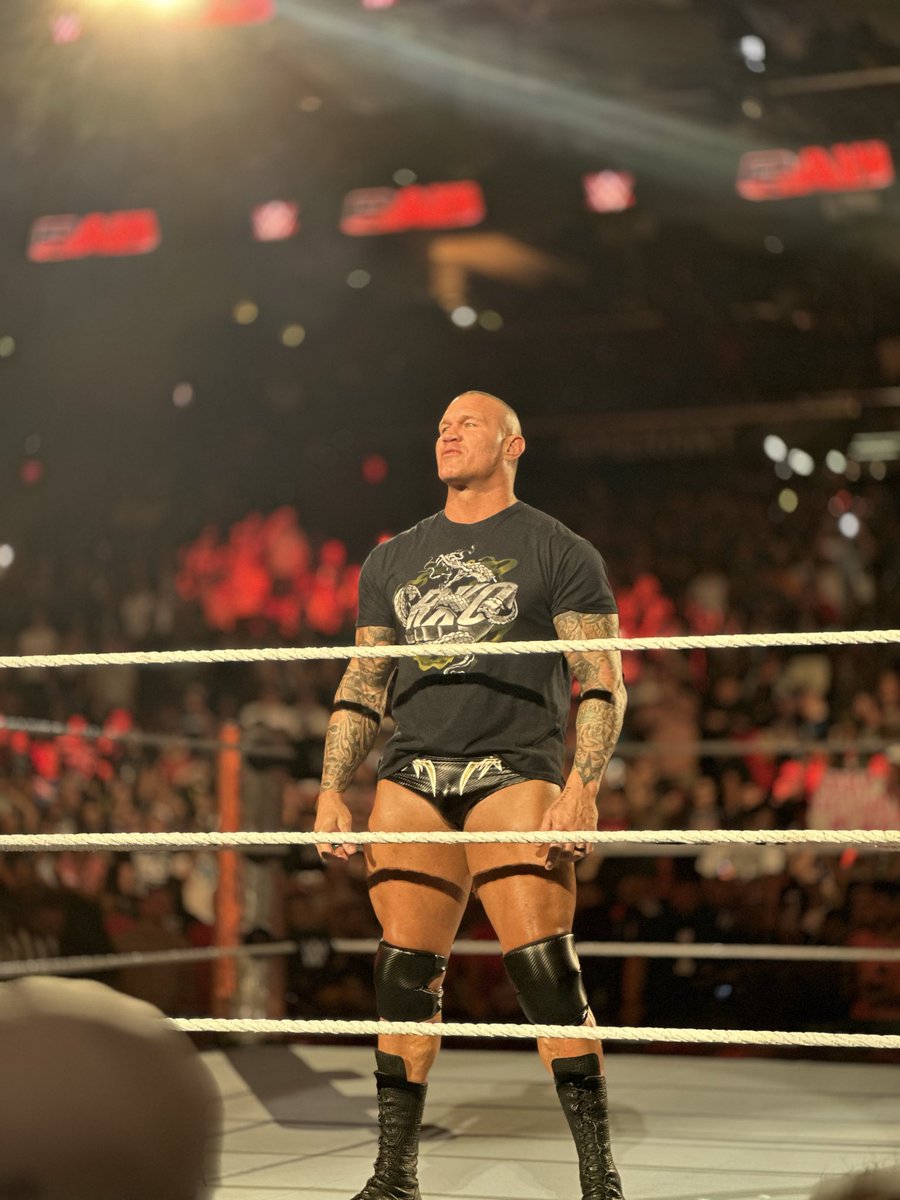 SaturdayMain's tweet photo. So funny enough, when Randy Orton returned at Survivor Series in 2023, @revtheory, the band responsible for “Voices” released a remastered and more metal version of the song on their platforms.

I was ringside for Raw in Sunrise,FL in August of 2024 and I had sat next to the lead vocalist of Rev Theory, Rich Luzzi and I didn’t catch on to it until Randy came out and I started singing the lyrics so loud it caught his attention. When I took the opportunity to ask him about the newer version of the song possibly being used he said that it’s there if the company would want to use it but there wasn’t a call made to have the newer version be used.

After last night, I feel that like yourself, Randy’s theme should be that newer version of “Voices”. It fits this methodical and calculated heel stance that he’s taking and it will work because none of the lyrics changed so every fan can continue singing the song.
