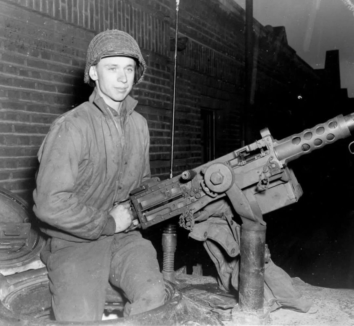 CPL Edward Romatowski with the M2 Browning .50 MG on his Sherman in Krefeld, Germany - Early March 1945