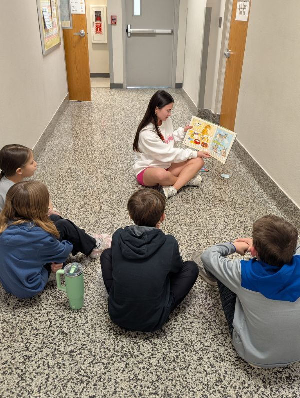 GCSD_HS's tweet photo. GHS Hope Squad Students Support "Read Across America" Week with reading books to elementary students at NE and West! Thank you student leaders! https://t.co/2AYzHatDQM