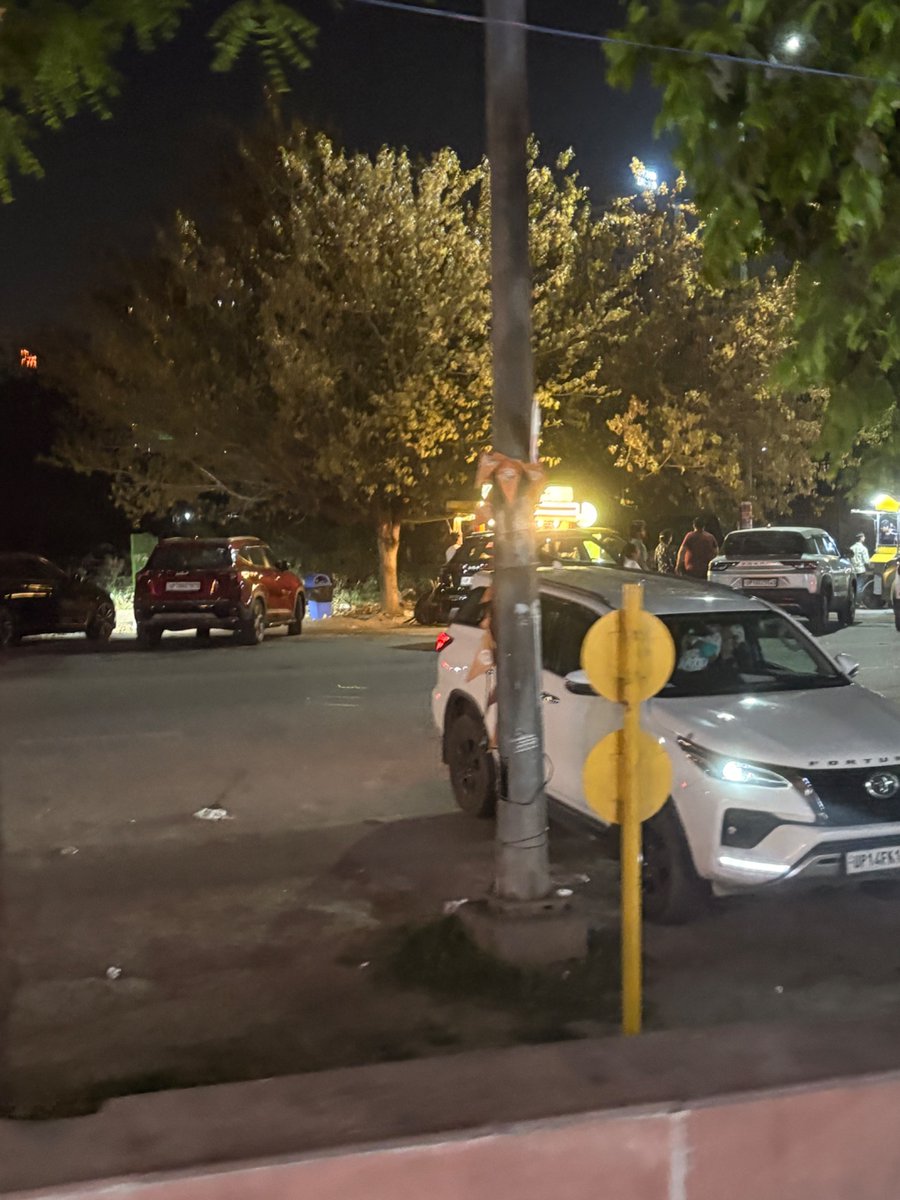 <a href="/dmgbnagar/">DM NOIDA Gautam Buddha Nagar</a> <a href="/noidapolice/">POLICE COMMISSIONERATE GAUTAM BUDDH NAGAR</a> <a href="/CeoNoida/">CEO, NOIDA Authority</a> <a href="/noida_authority/">NOIDA Authority</a> <a href="/HTNoidaGzb/">HT Noida & Ghaziabad</a> <a href="/Uppolice/">UP POLICE</a> <a href="/myogiadityanath/">Yogi Adityanath</a> <a href="/myogioffice/">Yogi Adityanath Office</a> 
Behind JM Orchid Society, Sector 76 Noida-201301 food karts are selling Non Veg within 200 meters of temple and people drink alcohol openly in cars till post midnight

#noida