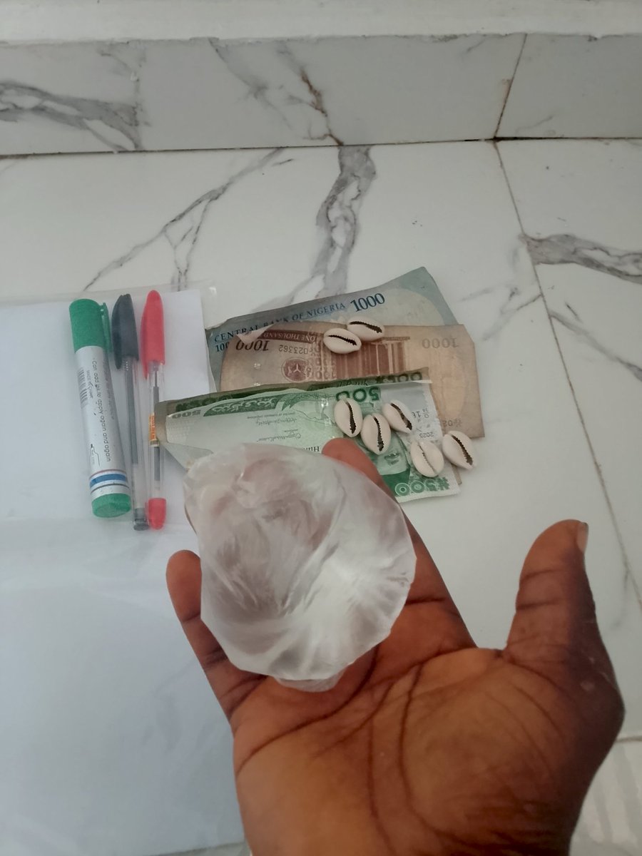 Get twelve pieces of male cowries (male is the close bumbum ones while females is the opened bumbum one)...

Pour it into a bottle of hot drink.., tie a green string round the mouth of the bottle.

Leave it for seven days.., then every morning as you go out for your business take