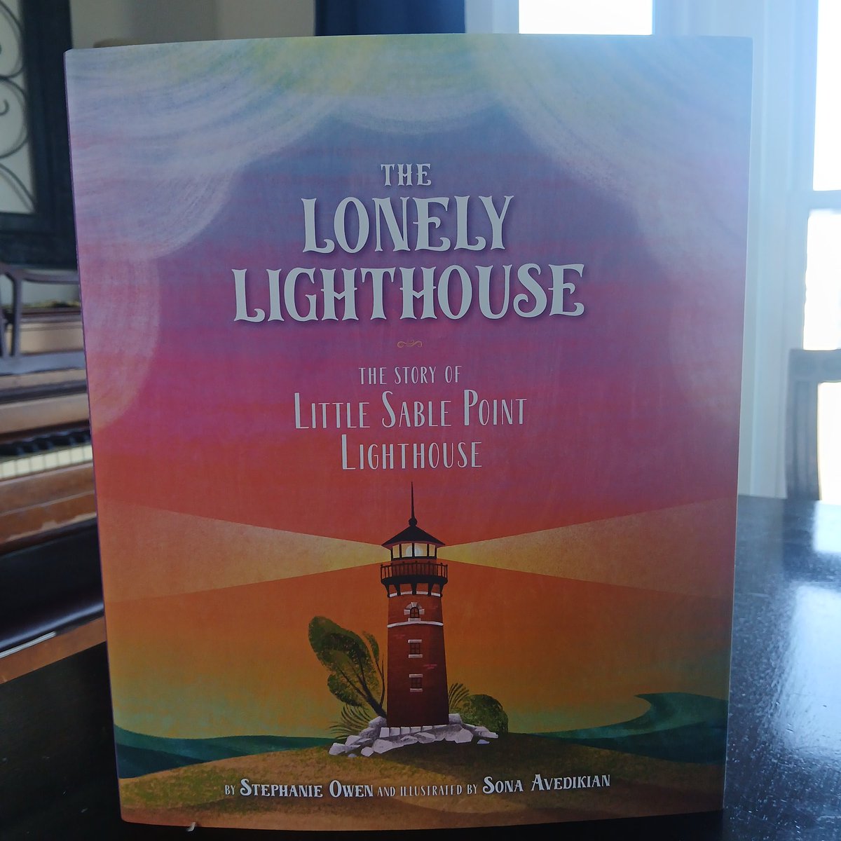 queryme525's tweet photo. I am so excited to receive my agent copies of The Lonely Lighthouse by Stephanie Owen from Sleeping Bear Press!! This picture book is illustrated by Sona Avedikian.

The Lonely Lighthouse is a true story of The Little Sable Point Lighthouse in Mears, Michigan. https://t.co/6YEcVHsVjQ
