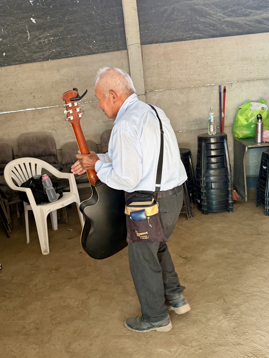 SethPolk's tweet photo. Everyone can serve in the church. This man is in his mid 80s and he is the keeper of the guitar. He takes it home and brings it back safely when it’s time for worship in a rural area in Peru. https://t.co/3RlomujI3n