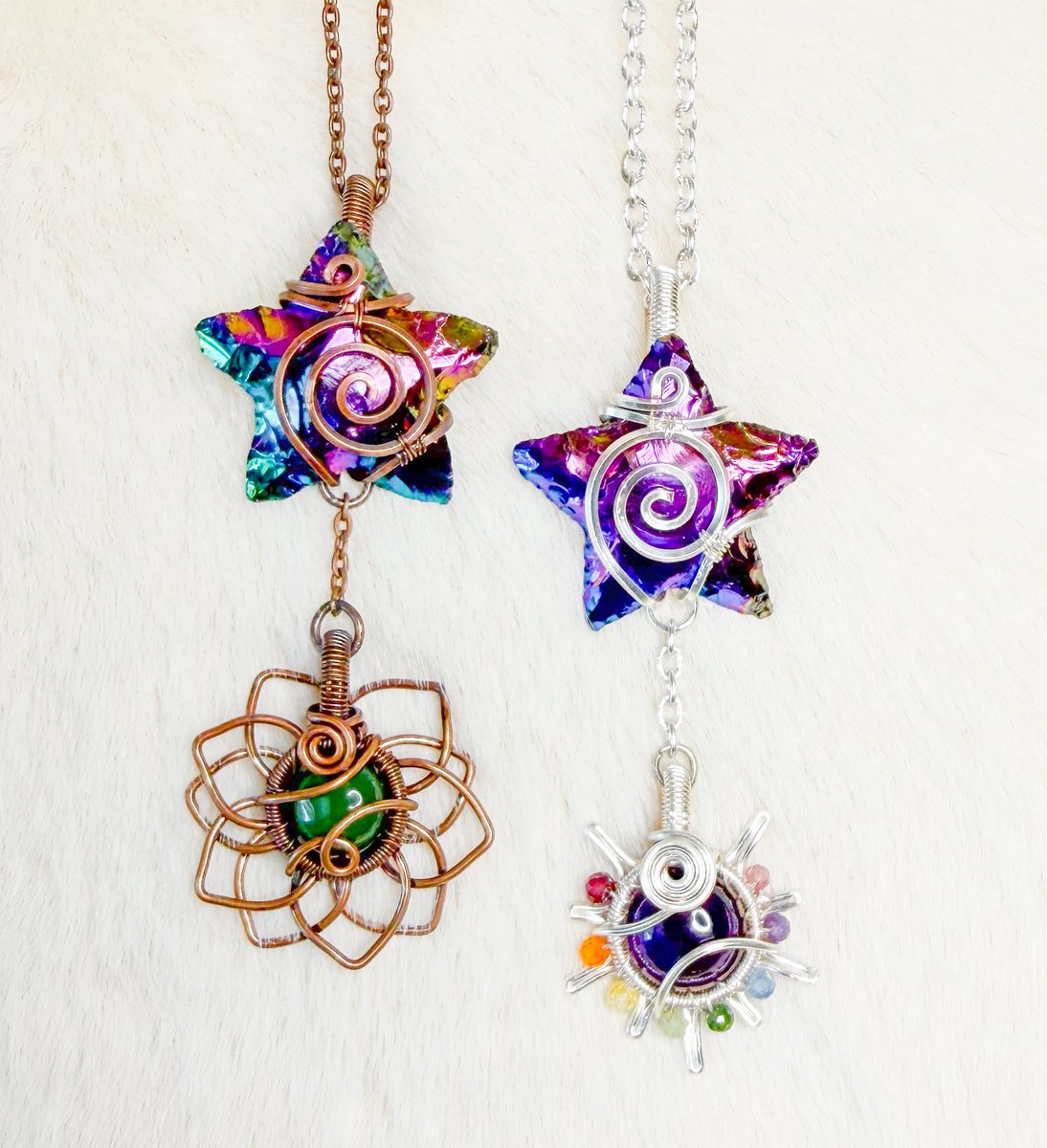 titanium aura quartz star pendants, one with a jade sunflower &amp; the other with an amethyst rainbow beaded sun 💚🌟💜

“Starlight Glimmer” collection coming to my shop Thursday 3/19 at 8pm eastern time💜🪼🧚‍♀️