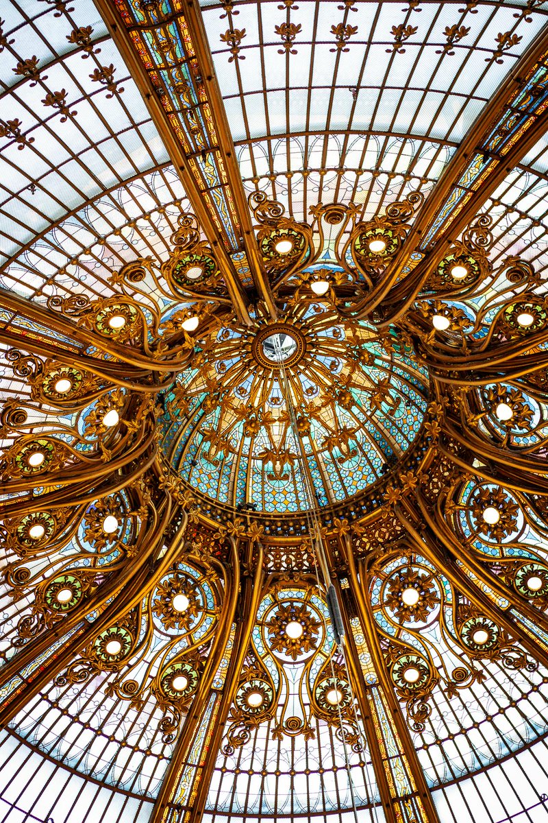 archpng's tweet photo. Not a dome, but a burst of stained glass and iron.
This is the famous cupola of Galeries Lafayette Paris Haussmann, completed in 1912 and designed as a giant luminous flower of stained glass above the department store’s central hall. More than a retail interior, it remains one of Paris’s most spectacular surviving Art Nouveau spaces.