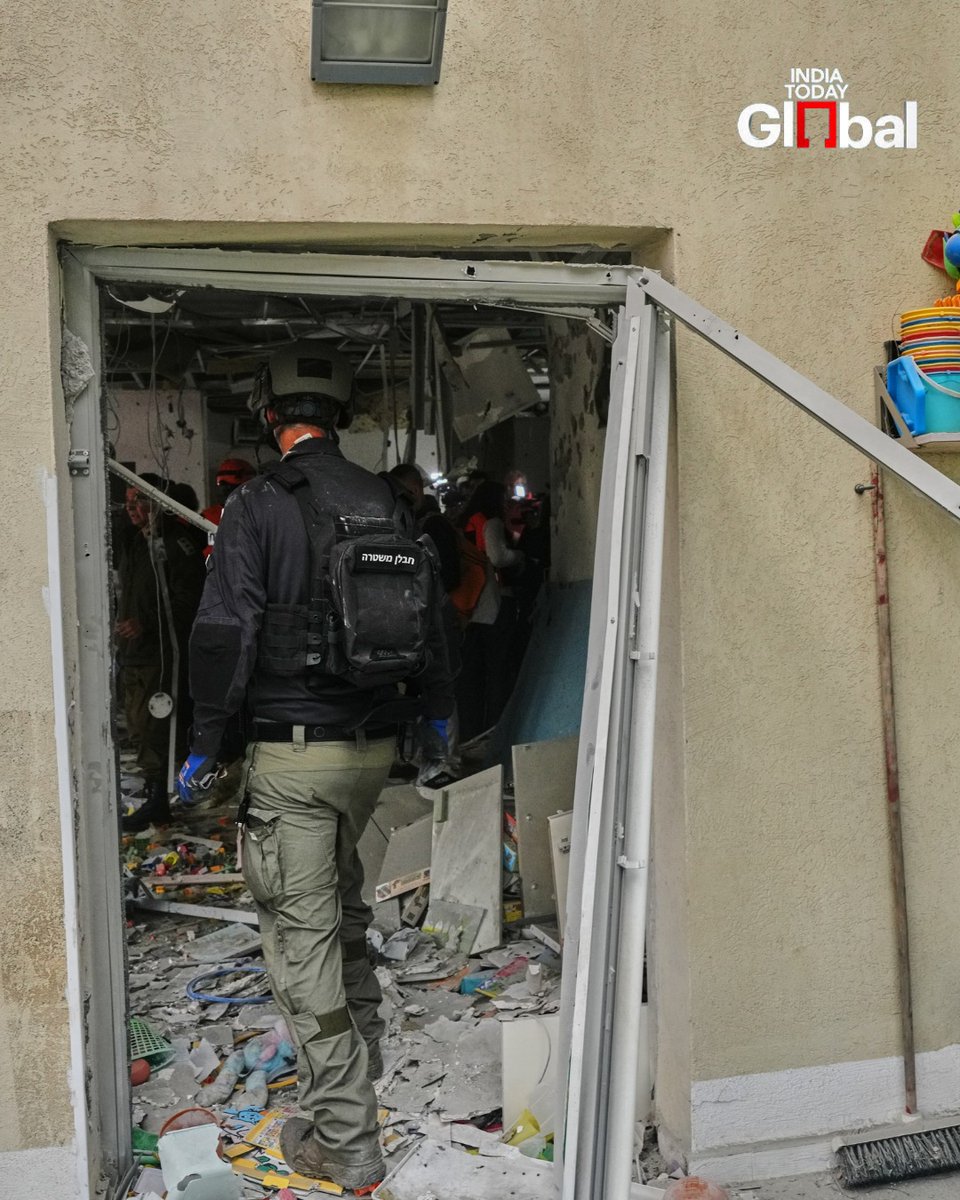 IndiaToday's tweet photo. #InPhotos: A missile fragment struck a school in Israel on Saturday, March 21, 2026, highlighting the escalating tensions in the region. No casualties reported so far.
#RishonLeZion #IranMissile #IsraelConflict #MiddleEastTensions #IndiaTodayGlobal https://t.co/bHTRPRHxQH