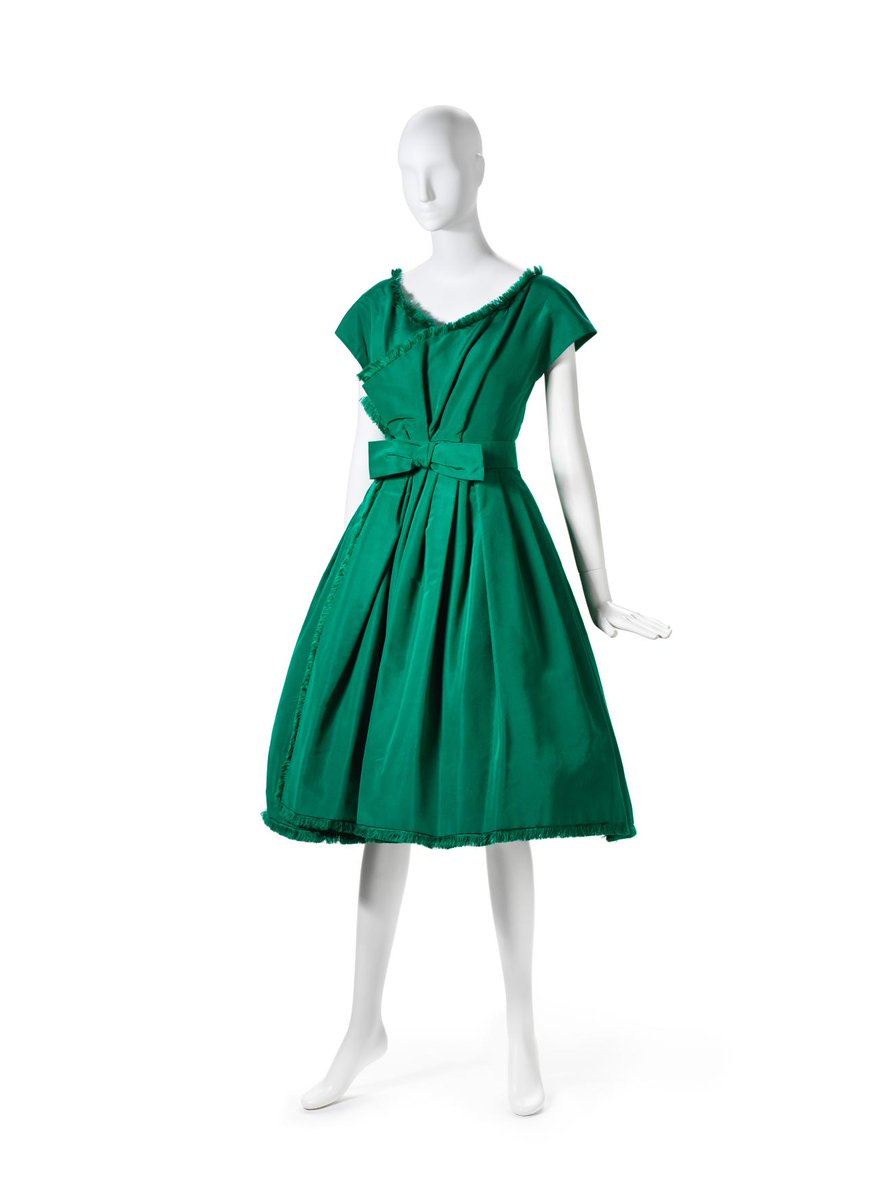 LaurenCDeutsch's tweet photo. #Ootd is this 1959 Dior cocktail dress by Yves Saint Laurent. It was YSL's third collection as the creative director of Dior and with his Longue collection he wanted something, "deliberately young, light hearted, typically 1959." The dress is indeed playful with its bright color https://t.co/nb9UH8ocf5