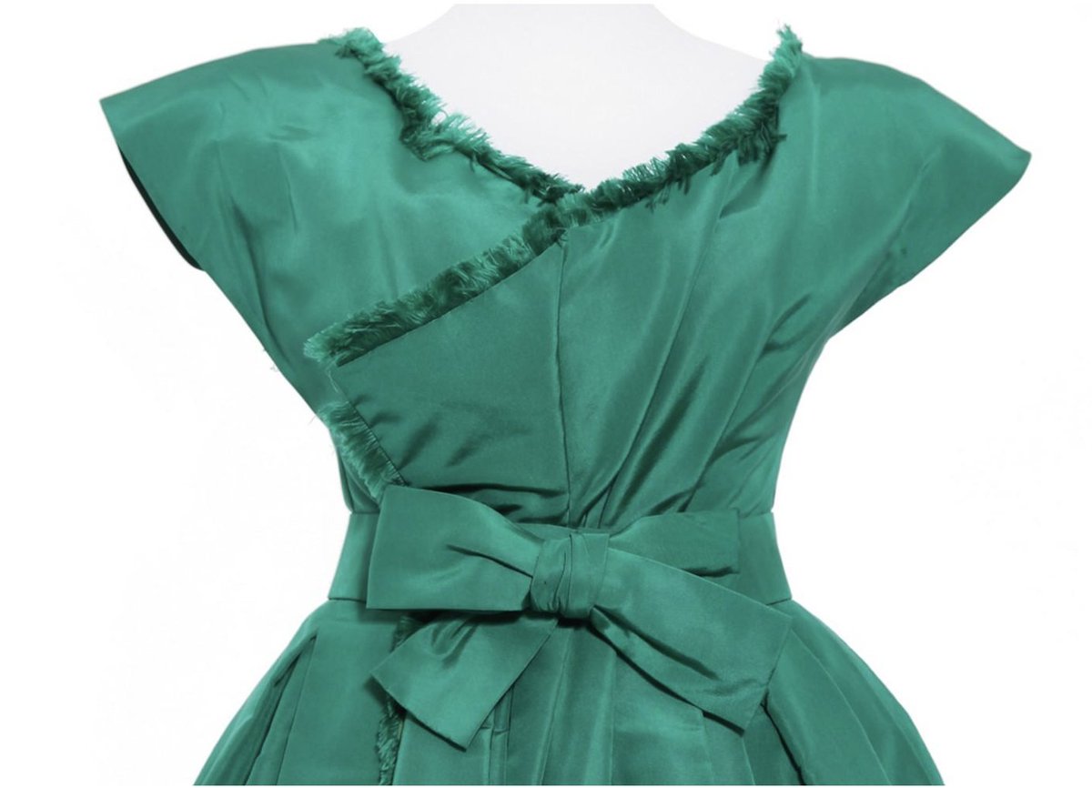 LaurenCDeutsch's tweet photo. #Ootd is this 1959 Dior cocktail dress by Yves Saint Laurent. It was YSL's third collection as the creative director of Dior and with his Longue collection he wanted something, "deliberately young, light hearted, typically 1959." The dress is indeed playful with its bright color https://t.co/nb9UH8ocf5