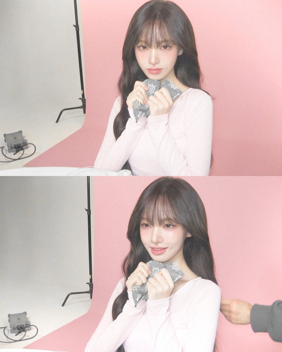 Wrapped in blush-toned light, she holds a quiet universe between her fingertips, where soft dreams flutter like petals in spring. Her gentle gaze hums a lullaby of warmth, blooming in silence. Sweet, tender, and endlessly radiant, like a fleeting piece of magic.