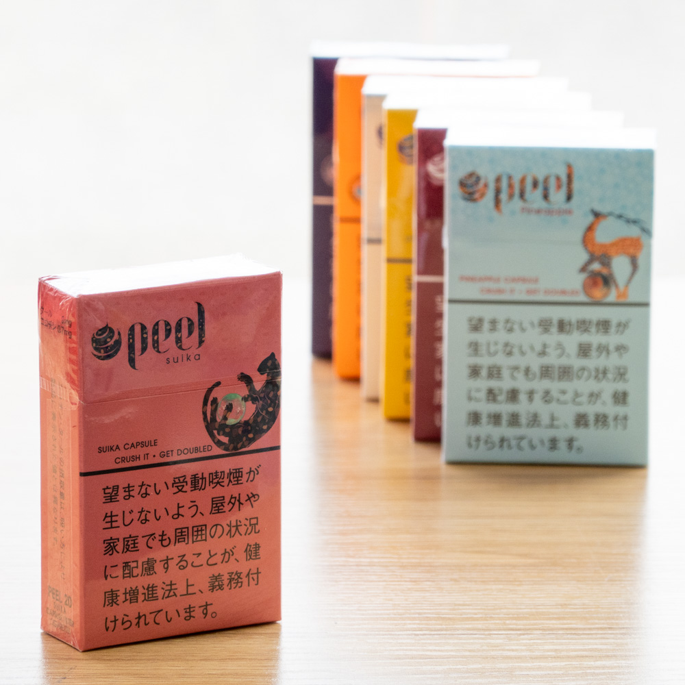 2026年4月発売「ピール スイカ」550円(20本入)

フルーツ系フレーバーの紙巻きたばこシリーズピールに新銘柄が加わります。

カプセルをつぶすと、ジューシーなスイカの風味が口いっぱいに広がり、メンソールの刺激と爽やかに混ざり合います。