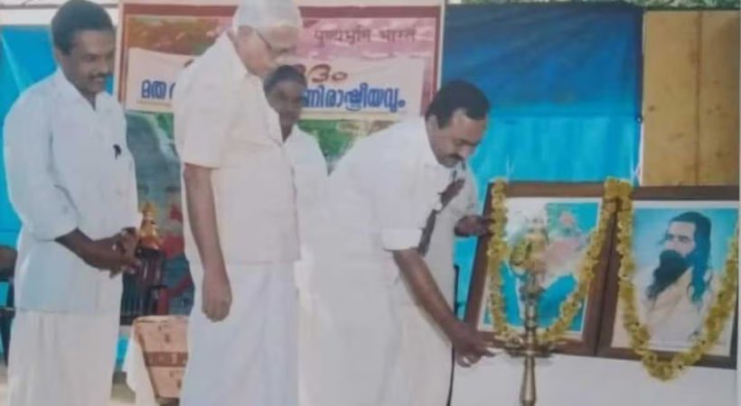 Comrade_India's tweet photo. @shamseerHashim VD Satheesan is a sanghi who lights a nilavilakku in front of MS Golwalkar’s photo. NDA has put weak candidates because they want him to become the next CM.

#CongRSS https://t.co/Ypy12XEgrg
