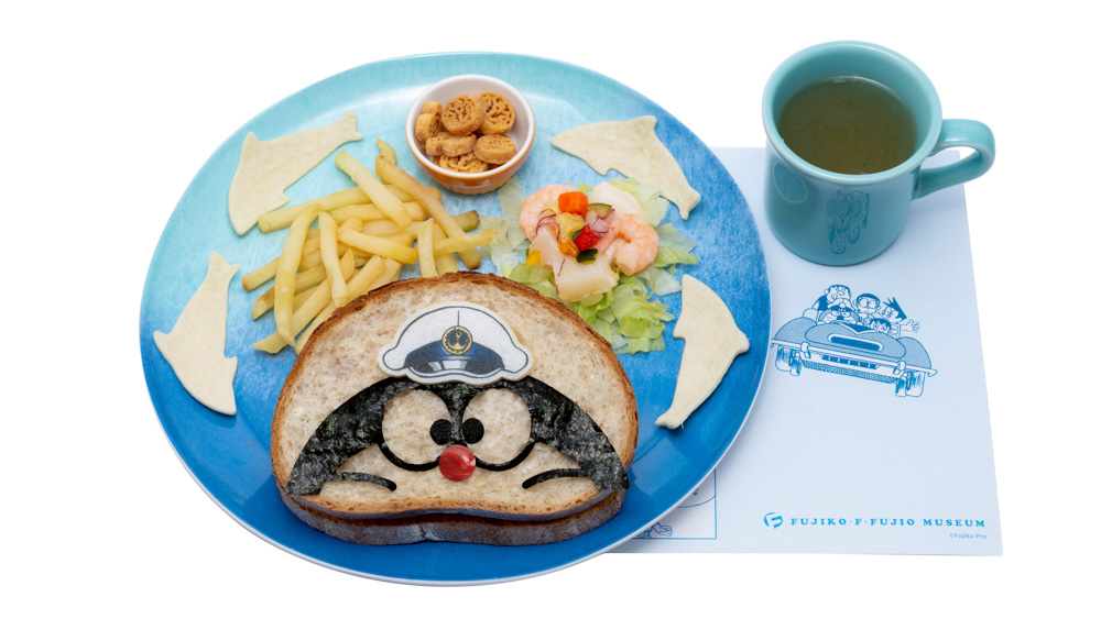 ミュージアムカフェ情報】 ただいま2F展示室Ⅱでは 「ドラえもん