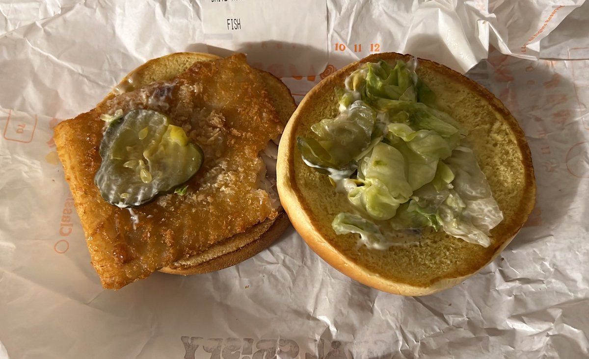 jetsetwithcoco's tweet photo. What happened to @BurgerKing big fish? Thought it was in a hoagie style bun. If I wanted a sad sandwich I’d have gone to the clown. https://t.co/mIwCsdrQJG