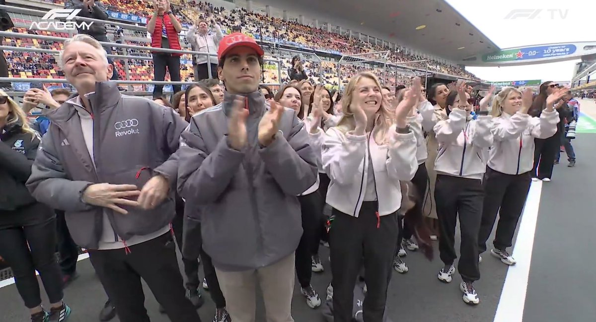 Gabi, Wheatley and the female crew of Audi celebrating Emma’s F1 Academy maiden win representing the team 🤍