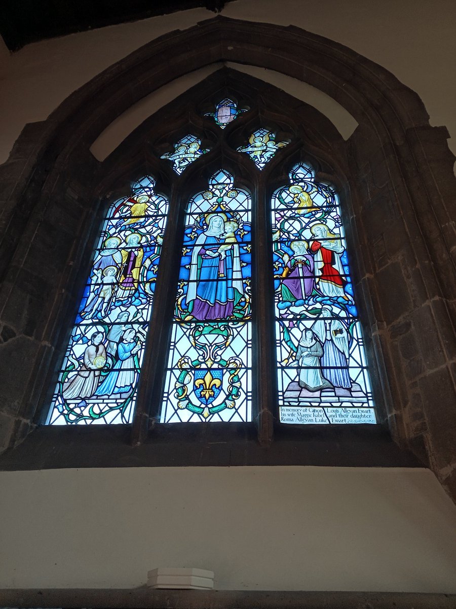 phil0073's tweet photo. #StainedGlassSunday in #AllSaintsEarlsBarton . In memory -Cannon Ewart,Wife Maggie & their daughter Roma.Portrays Mary, Mother of Heaven & Jesus & female saints & more recent Heroines;#ElizabethFry #FlorenceNightingale #EdithCavell #MarySumner. #PhilOnaBike #WindowsOnWednesday https://t.co/5cPXkFGbYm