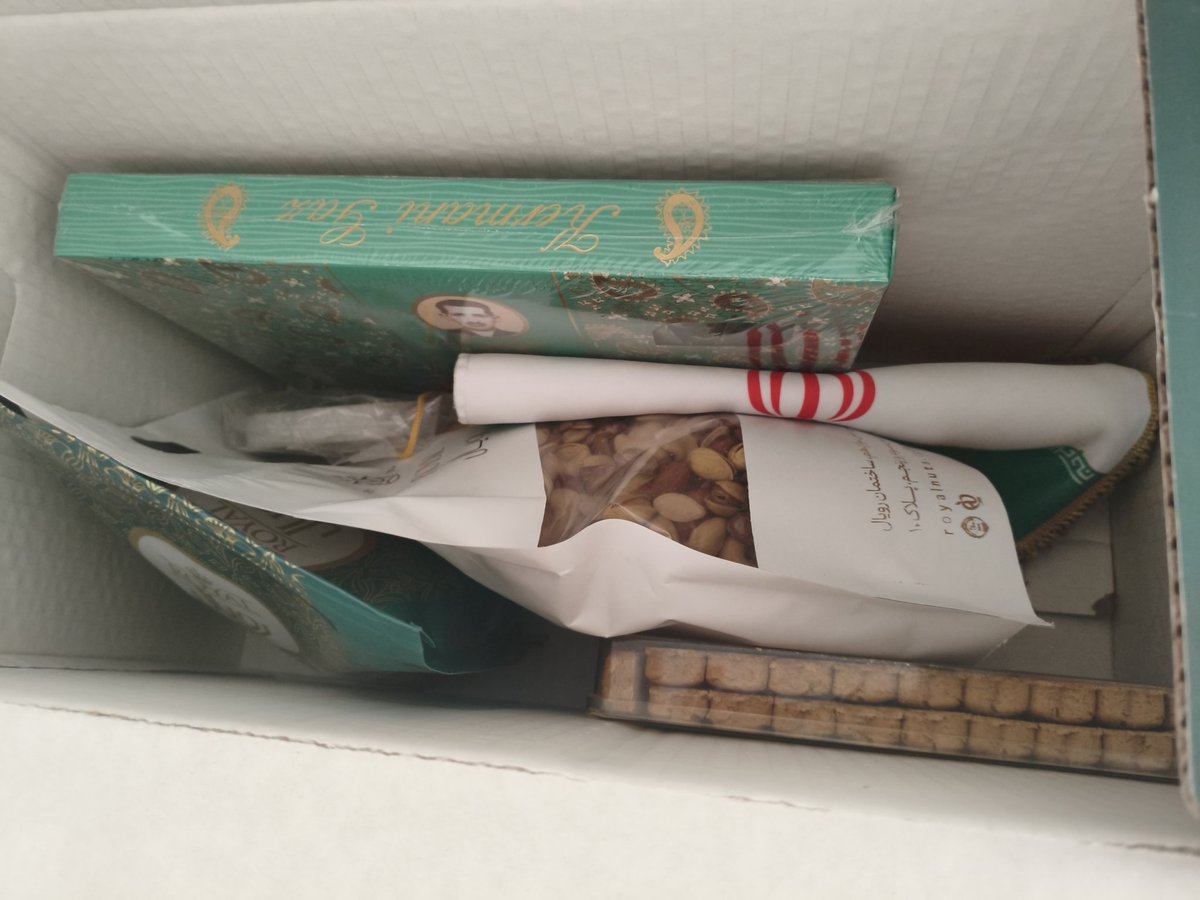 It is customary in Iran to give gifts during Nowruz. Companies that work with each other, as well as clients for their legal advisors, also send gifts. These Nowruz gifts typically include sweets, dried nuts, and flowers. A client has sent a gift, and in the gift package, they