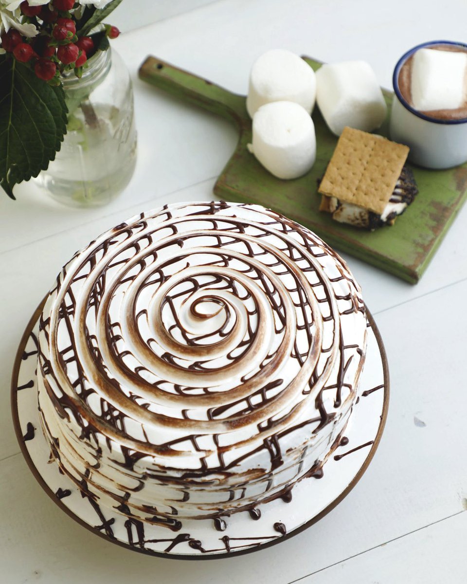 When our S'mores Cake is the star of the party, kids and adults alike just keep wanting more! This graham cake is filled with chocolate ganache and iced with meringue that has ganache swirled in. Available for pre-order. See link in bio for details. #MBakery #BakedFreshDaily