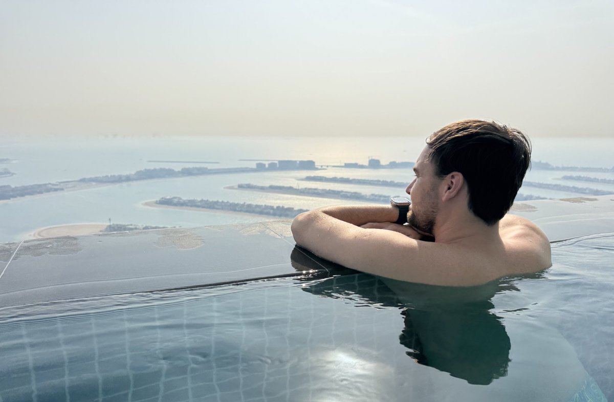 jamiebsmith's tweet photo. Today we continue suffering in the alleged war zone of Dubai at Aura Skypool the world’s highest 360° infinity pool. 

Pretty cool seeing the DXB departures taking off westbound before turning hard left and over the city currently. https://t.co/szakGyM7aQ