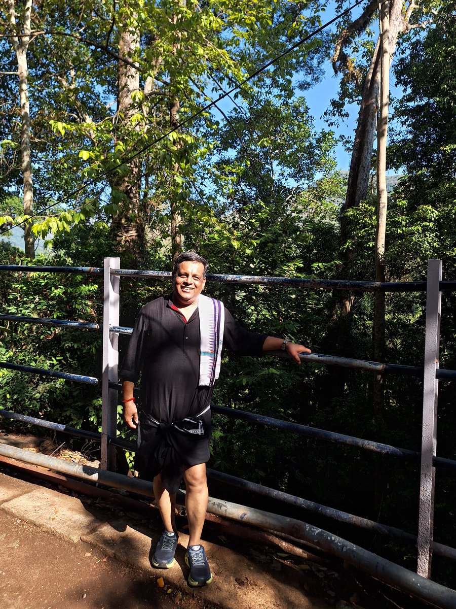 drkhuntia21's tweet photo. Enjoyed trecking today for more than 16kms up, down & around the #Sabarimala Temple from the sacred #Pamba river with dear friends, wearing tradional black. In love & devotion you dont ask for anything & just surrender, it trasnforms it into an ecstastatic experience. An invitation directly from Lord #Ayappa the experiences is for life to cherish💞 do visit once if you get a chance👌 #Keralam #Travel #Pilgrimage