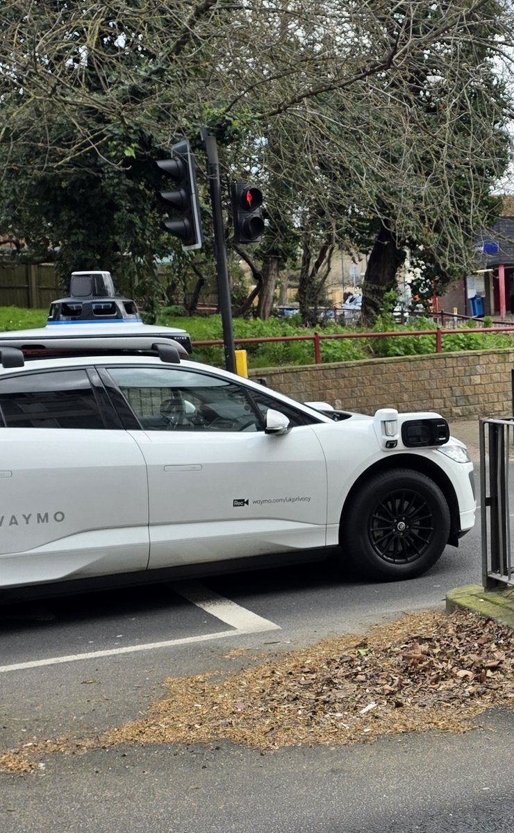aborley40's tweet photo. Today on my run i saw this driverless car ,down kensal green there was a person in the front seats https://t.co/XHJ1KPvuQk
