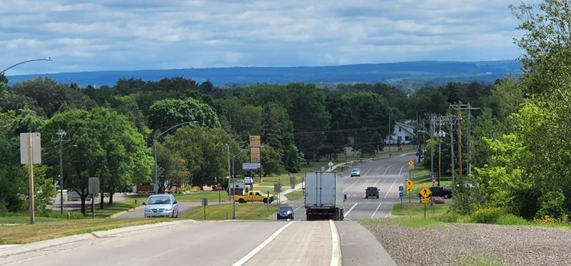 The (summer) view to the Blue Hills in eastern Washburn County, east of Rice Lake. U.S. 53 meets Highway 48 on the west edge of town, where you can get this view looking east.