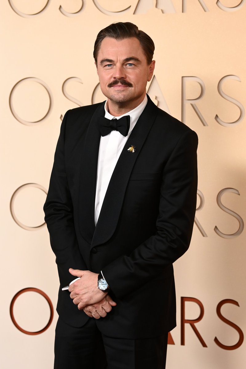 Movies's tweet photo. Best Actor nominee and ONE BATTLE AFTER ANOTHER star Leonardo DiCaprio poses on the carpet at the 98th #Oscars https://t.co/zpXW4pRDzt