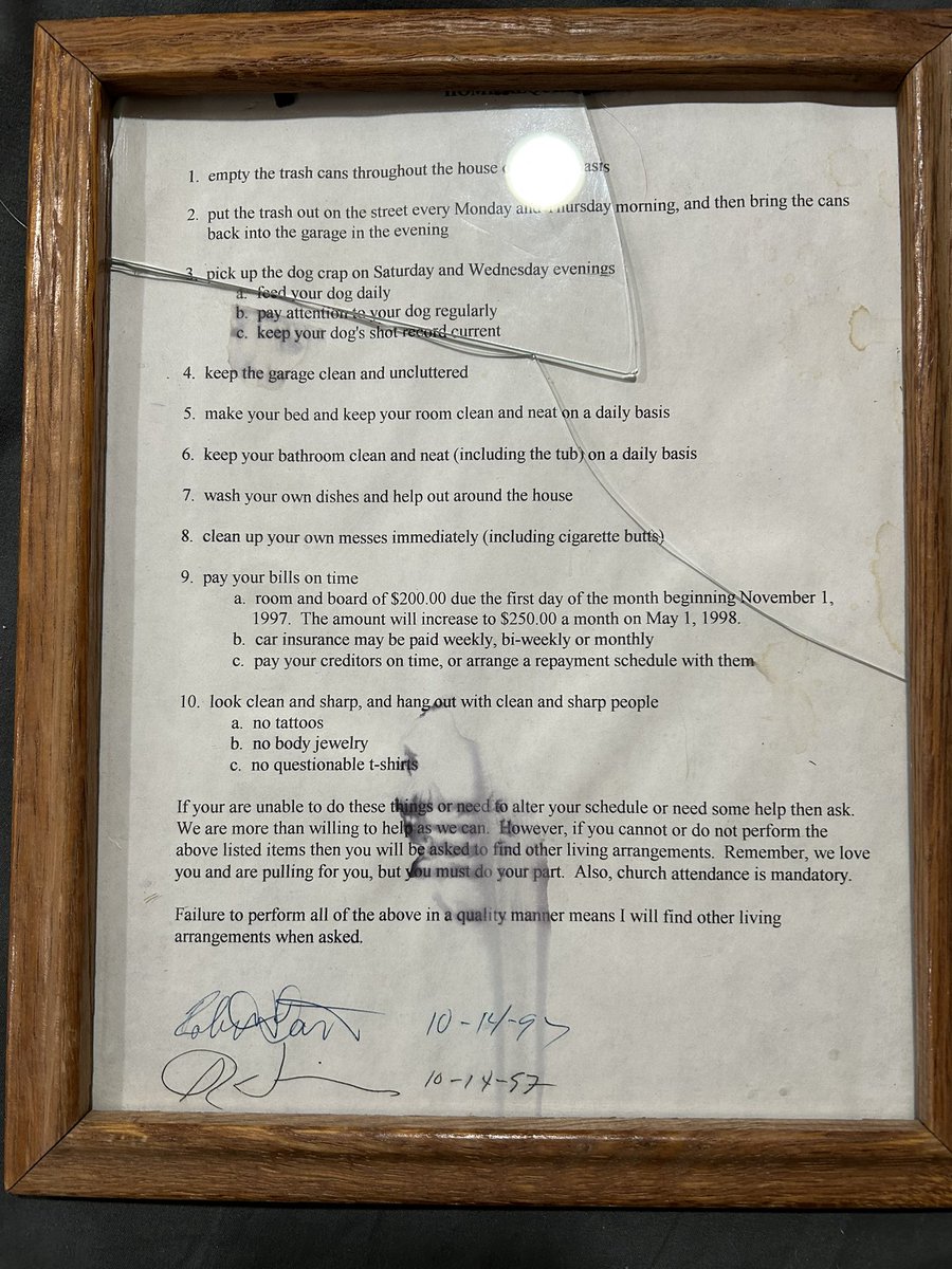 bertsnarts2's tweet photo. My dad didn't throw me out, but he did push me out. Decades later I've been summoned home as he is in his last few years. I have saved this since I left home. He had me sign a contract and he framed it then hung it on my wall. It's seen better days. Now that I'm back home I contemplate reframing and hanging it.