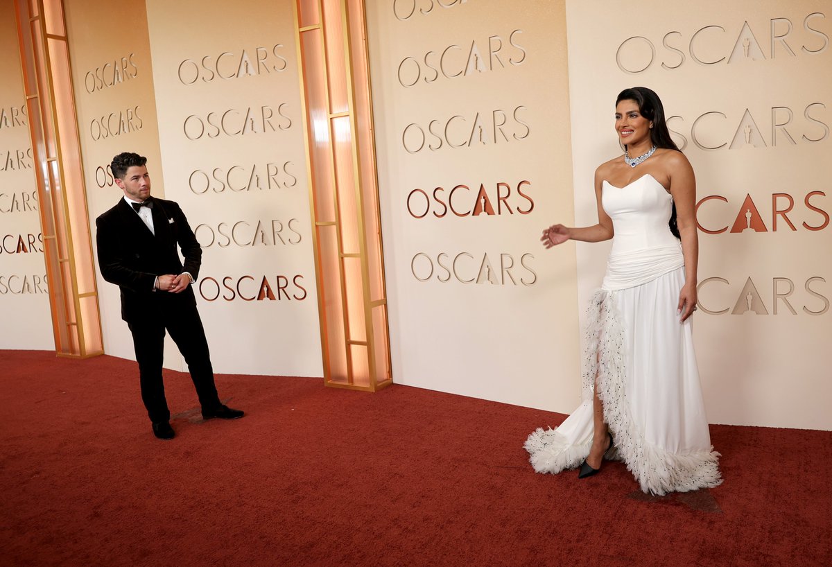 MTV's tweet photo. Get yourself a partner who looks at you the way @NickJonas looks at @priyankachopra 🥹 #Oscars https://t.co/dnERFOFS3J