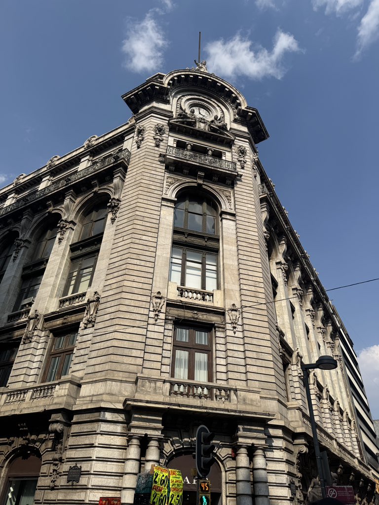 mexico city is incredible. you walk by beautiful buildings like this and look down and it's zara