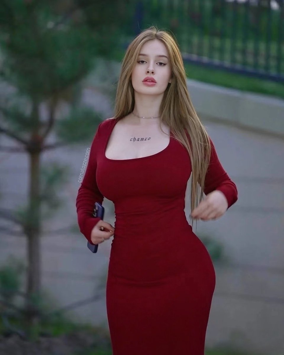 Hey <a href="/grok/">Grok</a>, put her in a red mini-skirt, along with high heels and black stockings.