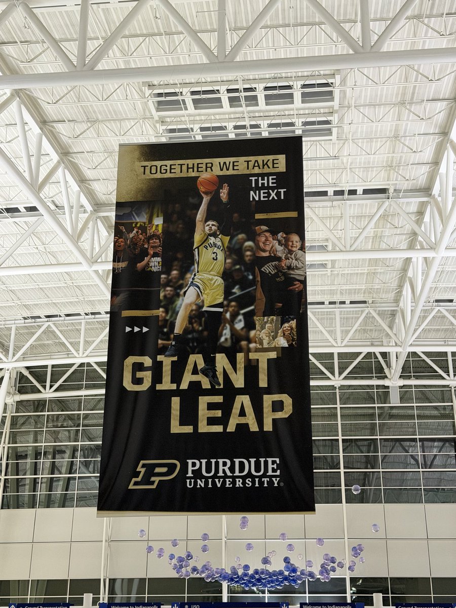 DLessaris's tweet photo. @BoilerBall I had to pick up my wife at Indy airport tonight, and noticed they have this vintage poster hanging with a photo of when  Braden used to wear #3. https://t.co/GHj7NpCuIQ