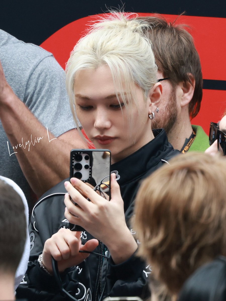 stray kids' felix taking pics/filming charles 🙂‍↕️🙂‍↕️ very real of him

📷: <a href="/lovelffllee1024/">Lovelylisa L</a>