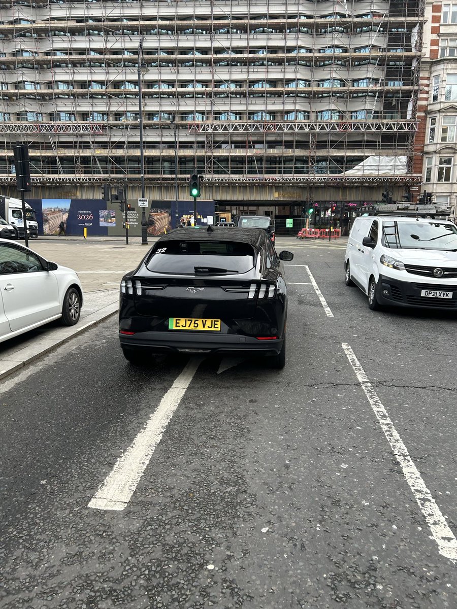 caractacus's tweet photo. @WaltLightShed @gbrulte An unbranded AV in London this morning (bad photo, sorry!). Pretty sure it’s Wayve - it’s a Ford Mach E and has the windscreen “bar”. I normally see more Wayves in London than Waymos, but I think that might be changing. https://t.co/69n4JnKkT2