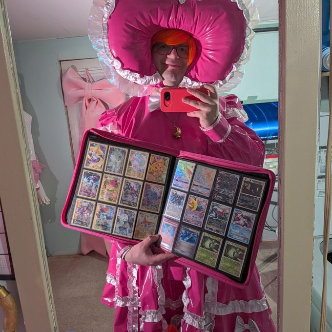 GracideaClub, PvcVee - 3 pic. Dressed up in my cozy PVC sissy bonnet outfit and working through packing some Pokemon bulk for sale tonight. It's not deep lore, but I used to play lots of card games, so here are a few favorites~ https://t.co/9vD41V3tkJ
