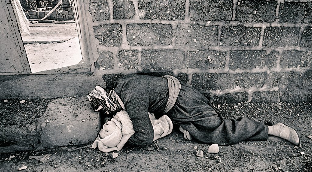 AlanDilan7's tweet photo. The sky turned the color of bruised plums. It tasted of sweet apples and betrayal, A ghost-drift through the narrow lanes. ​The mother’s arms are a frozen cradle, The child’s breath is a broken reed; In the silence of the midday sun. The earth drank more than it could feed. https://t.co/AVwFqWeMp4