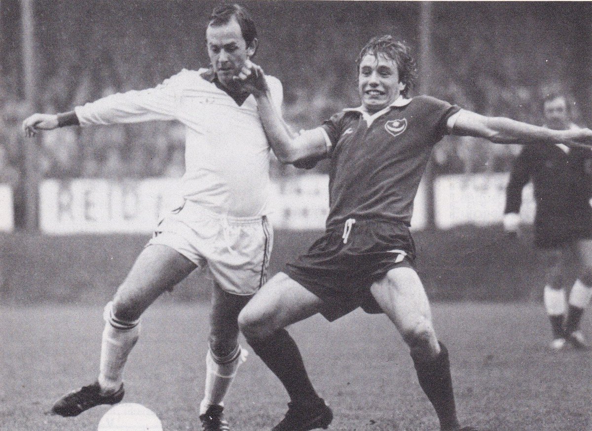 Referee Derek Lloyd (Fernhill Heath, Worcester) observes a challenge for the ball in the Exeter-Portsmouth game in September 1977. He was a supplementary ref from 1972 to 1974 &amp; then on the full list from 1974 to 1983.