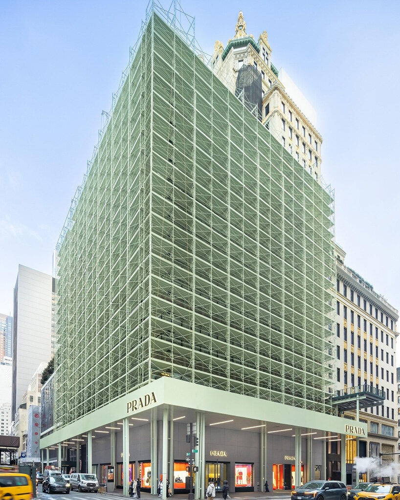 designboom's tweet photo. . @Prada fifth avenue flagship turns scaffolding into a shimmering, ever-changing #facade. pale green pipes and layered scrims shift with light and movement, showing how the temporary can teach us to see the city in a new way.

read more here: https://t.co/kqbTAzoHCX https://t.co/QShqHL1B3q
