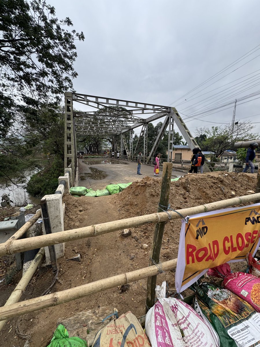 BahnimanT's tweet photo. Daily commute has become extremely troublesome for residents.

The bridge over Pamohi River connecting Garchuk (NH-27) to Pamohi was closed on 7 March. It’s been 10 days and no work has started yet.

Kindly look into this urgently.

📸 16.03.2026

@himantabiswa 
@CMOfficeAssam https://t.co/GMOntXP7WJ