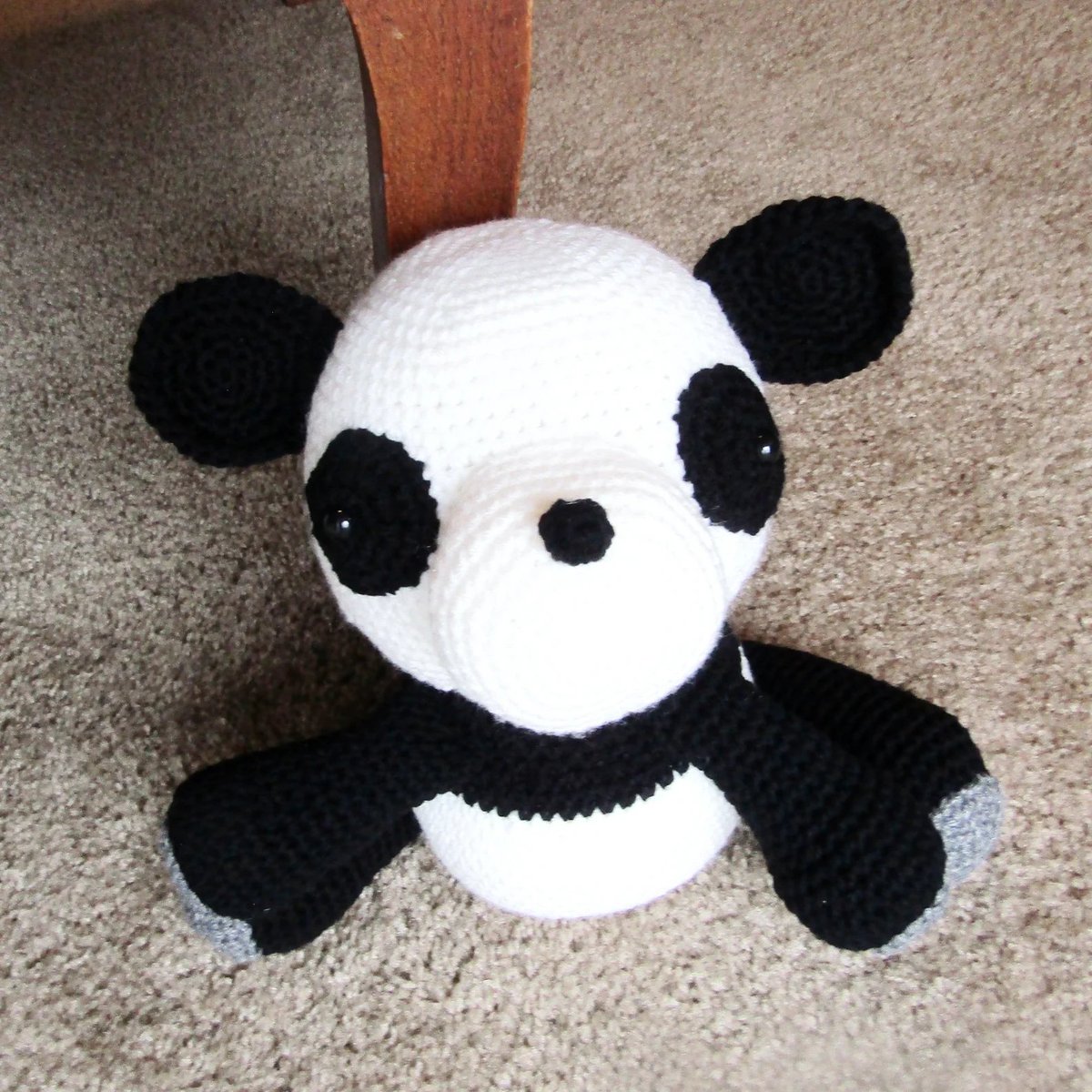 My handmade panda bear is a hugable handful of softness.  Today he celebrates #NationalGiantPandaBearDay. This plush version of a panda bear can be found in my #etsy shop. #PandaBear