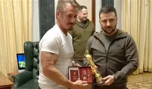 Hilarious! Zelensky will have three Oscars now, just like Nicholson, Streep, Day-Lewis and the great Walter Brennan.<a href="/ColinBest1978/">Colin Best</a>