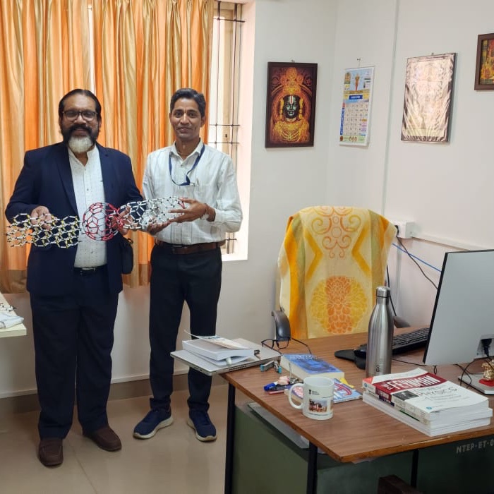 ismgraphene's tweet photo. Pro-VC @IIST, Prof Joseph in my office with my different models of carbon nanostructures https://t.co/Vz9KtPww2v