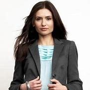 it feels illegal seeing karolina with long hair like who is that