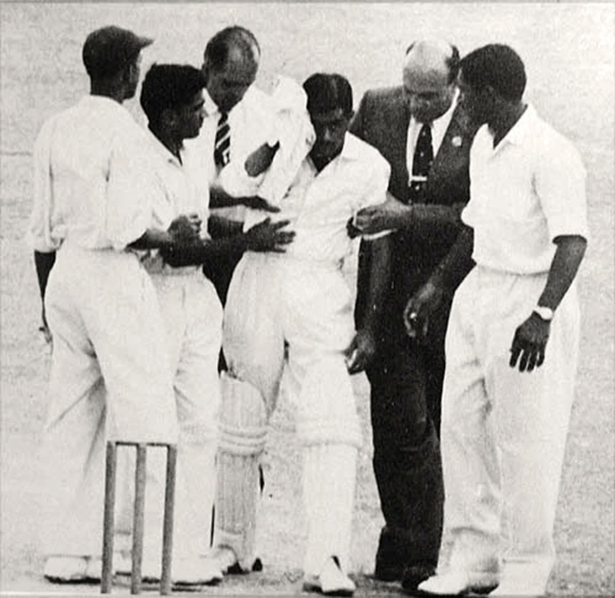 RSingh6969a's tweet photo. March 17, 1962: A "Black Day" for Indian cricket. On this day, #NariContractor was struck by a delivery from Griffith that ended his Test career. KN Prabhu, Berry Sarbadhikari, and two others waiting outside OT for news on Nari and Nari at London Airport on his way back to India https://t.co/MqCFNqBhlE