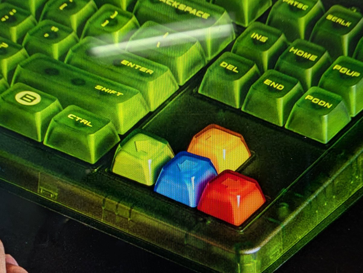 maxjwarren's tweet photo. @8BitDo there's an error on your product page for the Retro 87 keyboard. The Green and Blue arrow keys are the wrong way around, making it look wonky https://t.co/6sAdCf7tYj