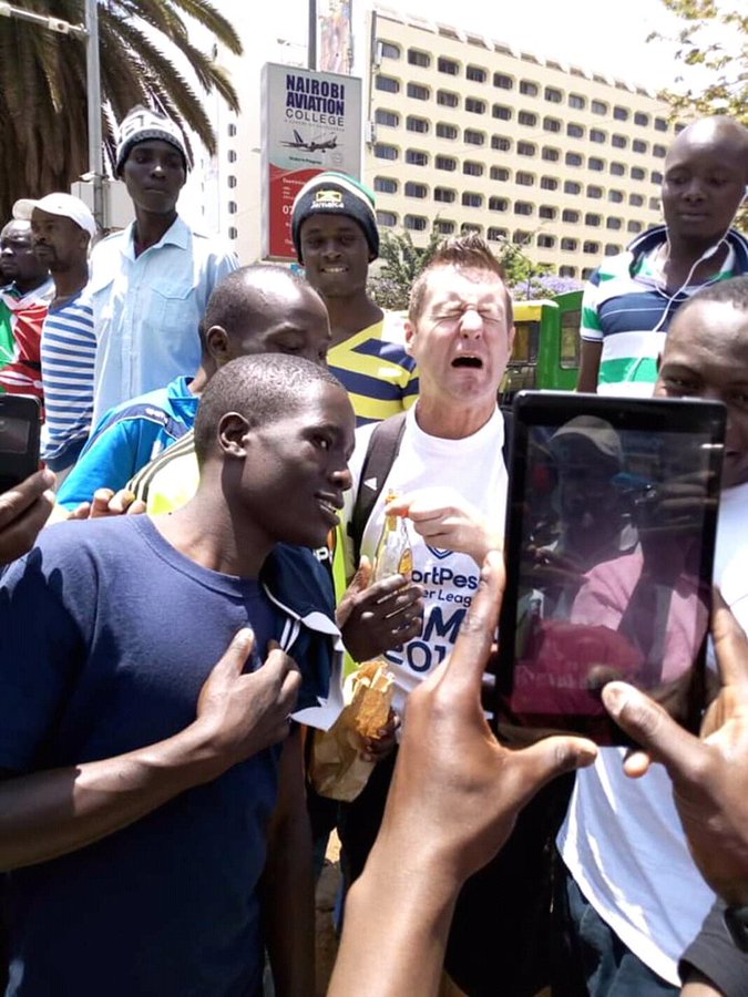 Mwawasi__'s tweet photo. #TBT when Gor fans gave their head coach konyagi! Hii pic hunimaliza sana alidhani anakunywa makaa moto 😂😂😂
#FootballKE https://t.co/H5dkeqPLyt