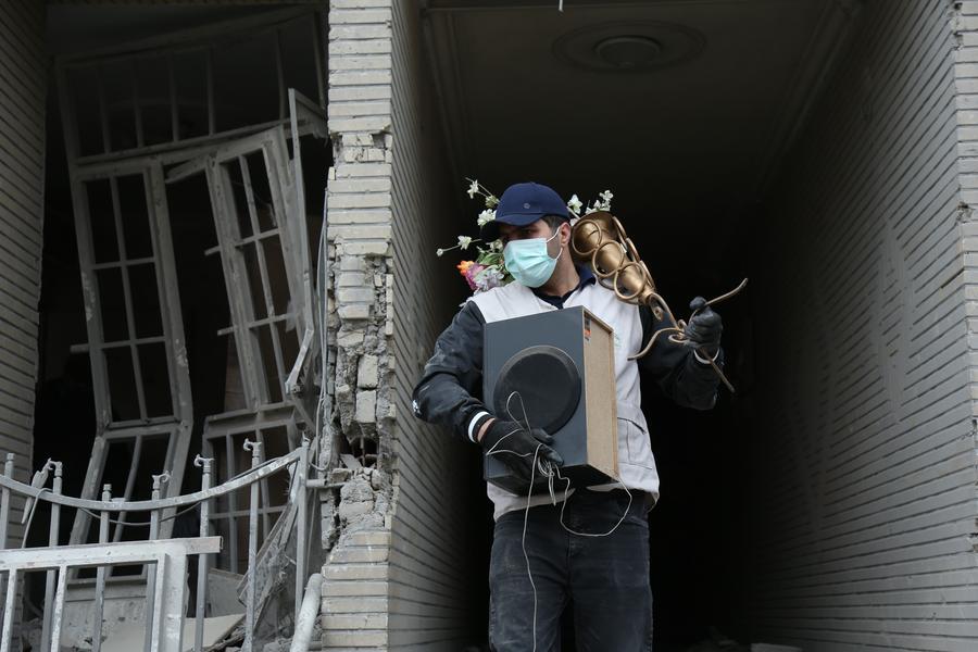 XHNews's tweet photo. #MideastInPictures: Over 61,000 civilian buildings damaged in U.S.-Israeli strikes on Iran https://t.co/6L9QF1RRvC https://t.co/OLK2eKR2DK