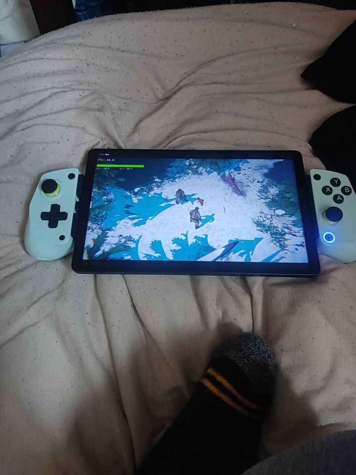 Ignore the random shot of my foot :D Loving the 4th Gen Lenovo Y700 tablet so far. Been trying out stuff on Gamenative