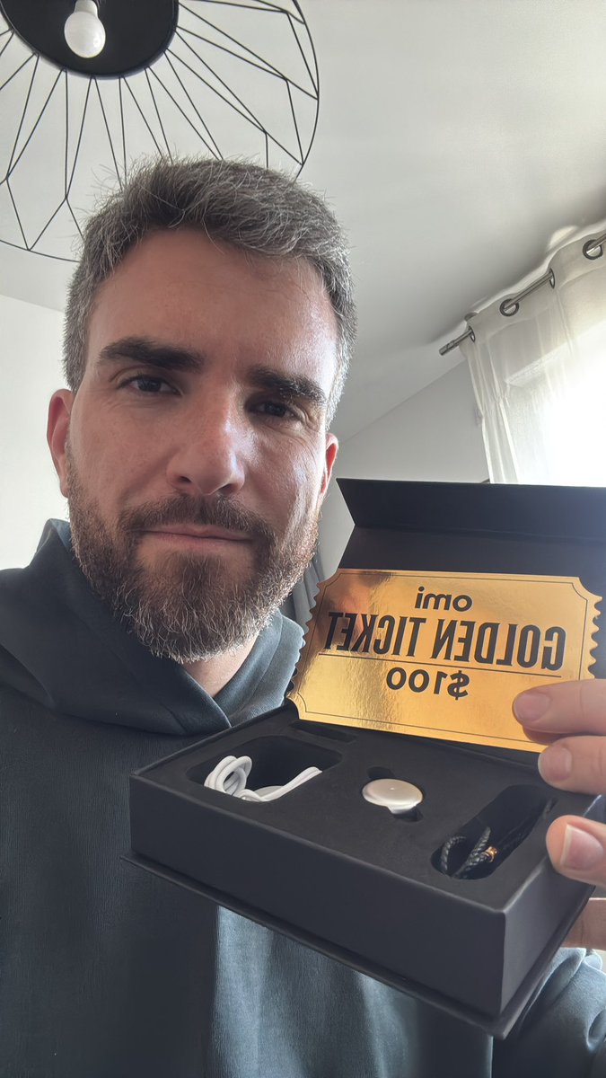 Just got my Omi device from <a href="/omidotme/">Omi AI</a> with a sweet surprise #goldenticket  
I'm hyped beyond words—feels like I hit the lottery but with actual Omi swag 🚀✨